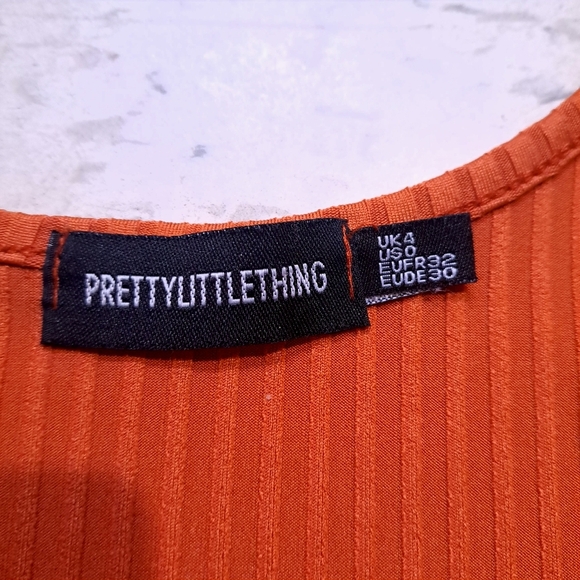 Prettylittlething | Women's Orange Ribbed Crop Top - Picture 4 of 7
